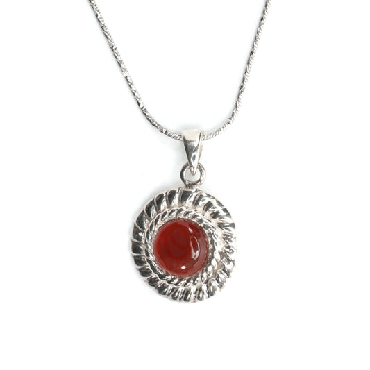 sterling silver red stone twist pendant in front view